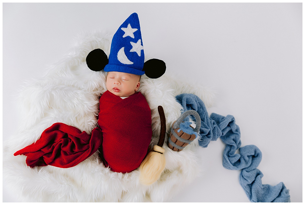Disney Newborn photos for a baby boy Sorcerer Mickey 