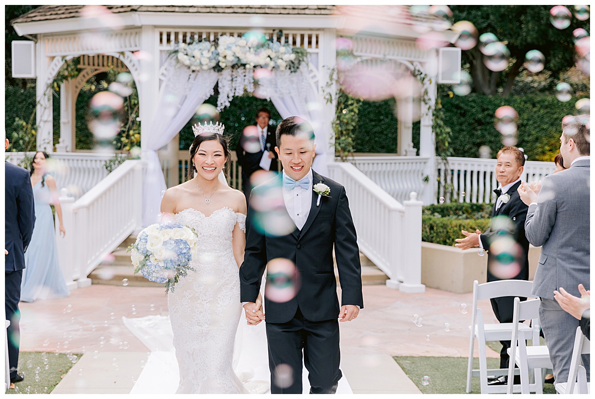 A Disneyland Hotel Wedding with a Rose Court Garden Ceremony and a Sleeping Beauty Pavilion Reception by White Rabbit Photo Boutique
