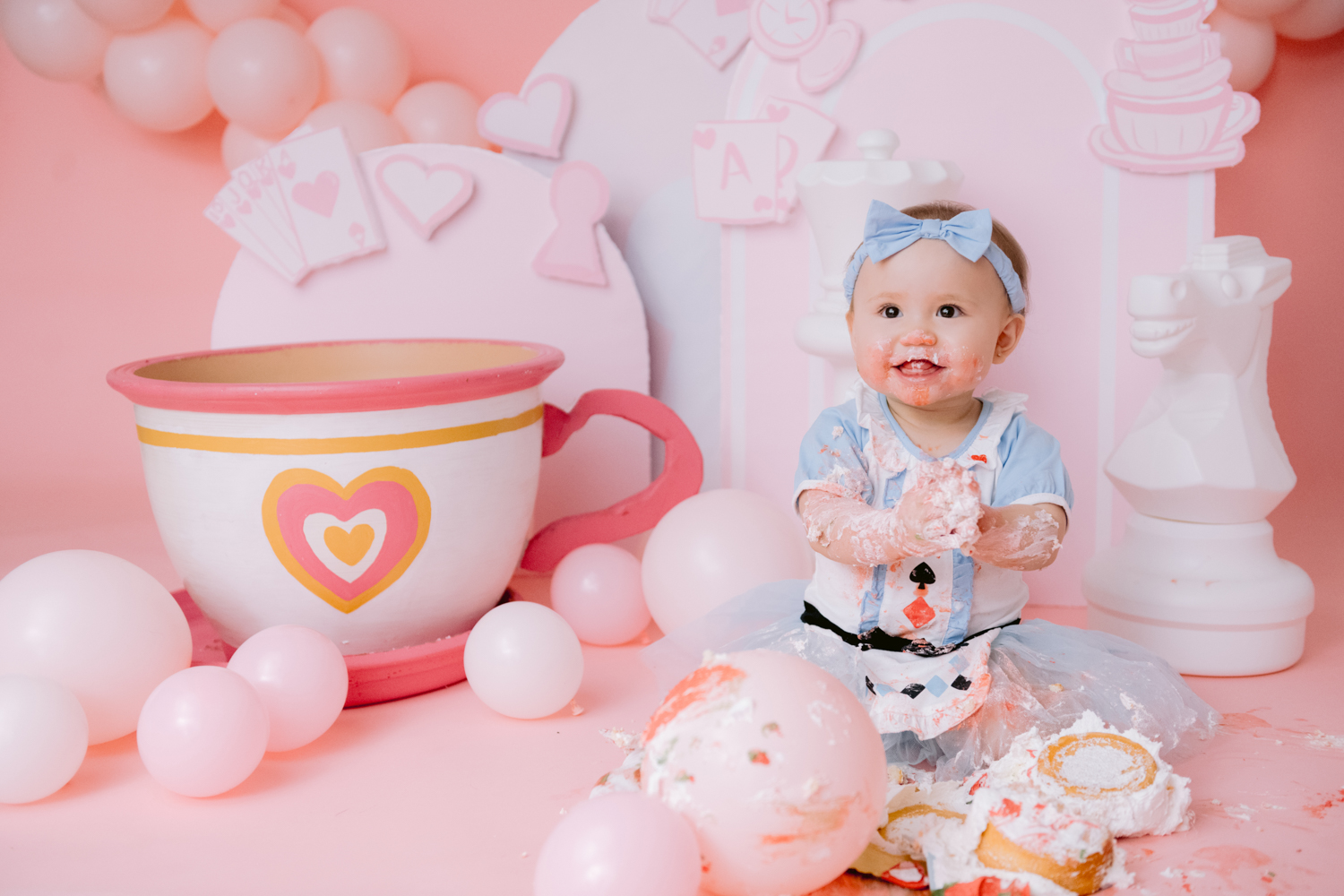 Custom Alice in Wonderland cake smash photographed by Orange County baby photographer