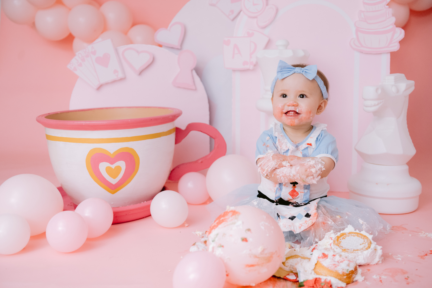 Custom Alice in Wonderland cake smash photographed by Orange County baby photographer