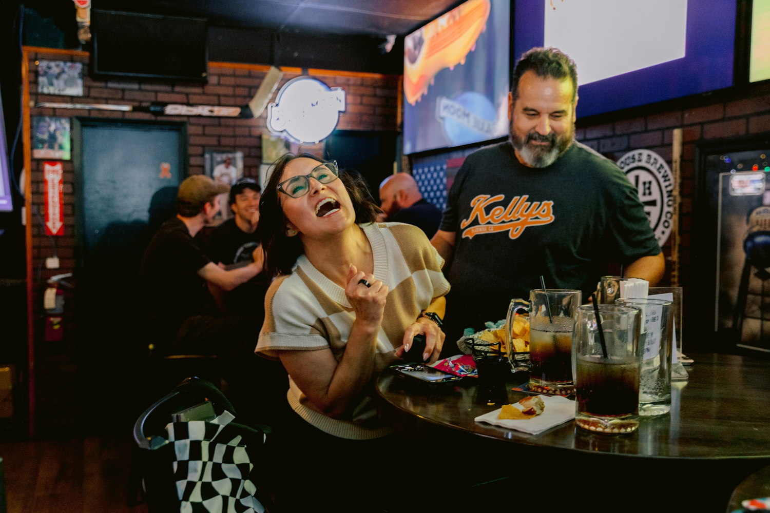 Surprise proposal at Kelly’s Korner Tavern captured by an Orange County wedding photographer