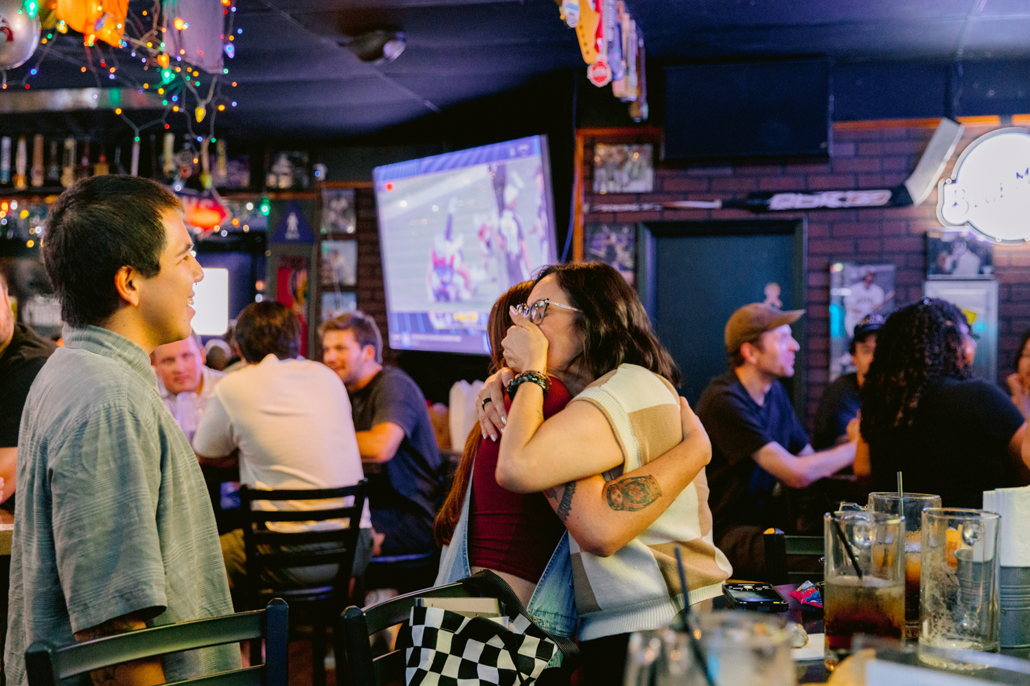 Surprise proposal at Kelly’s Korner Tavern captured by an Orange County wedding photographer
