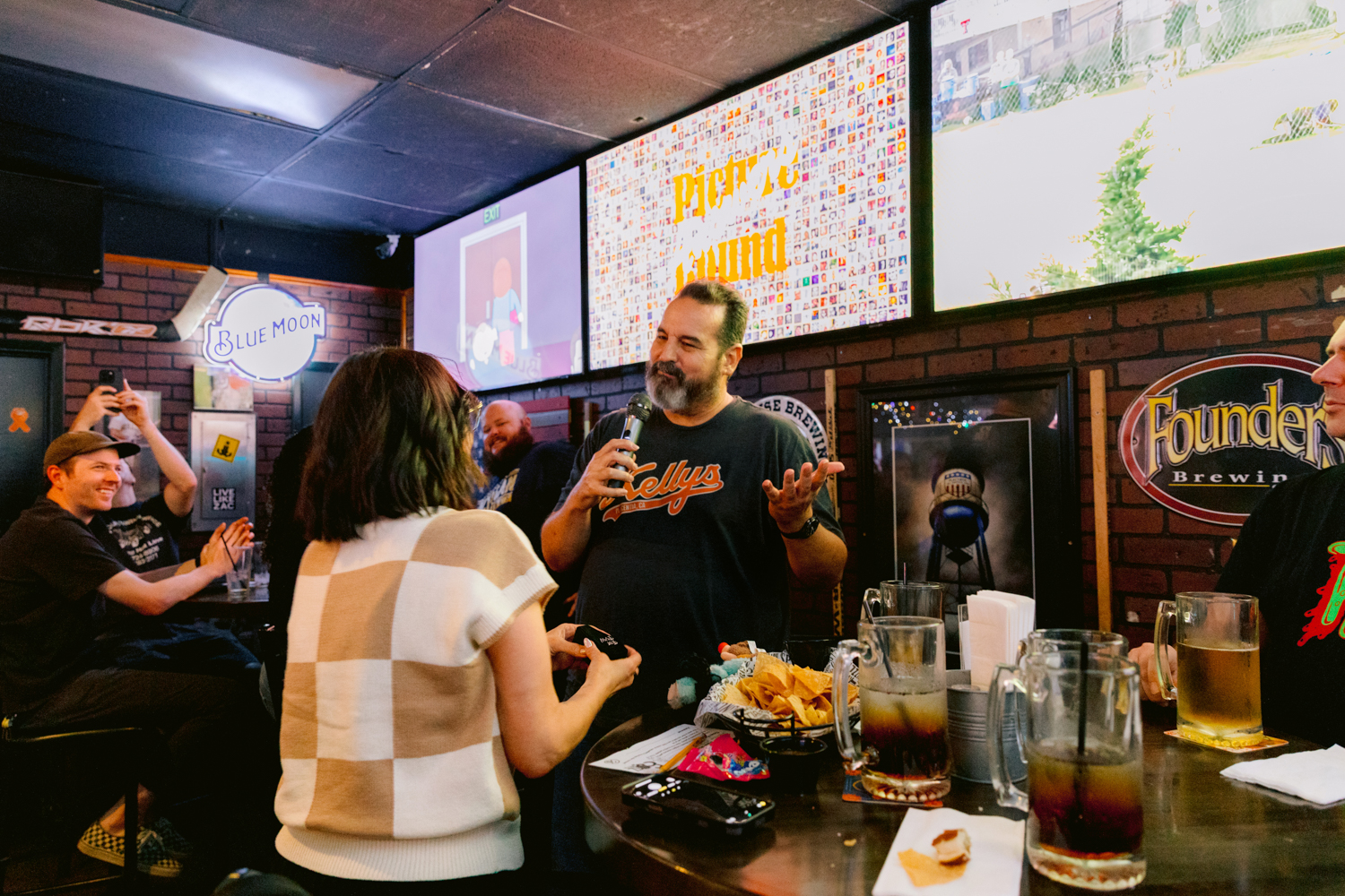 Surprise proposal at Kelly’s Korner Tavern captured by an Orange County wedding photographer