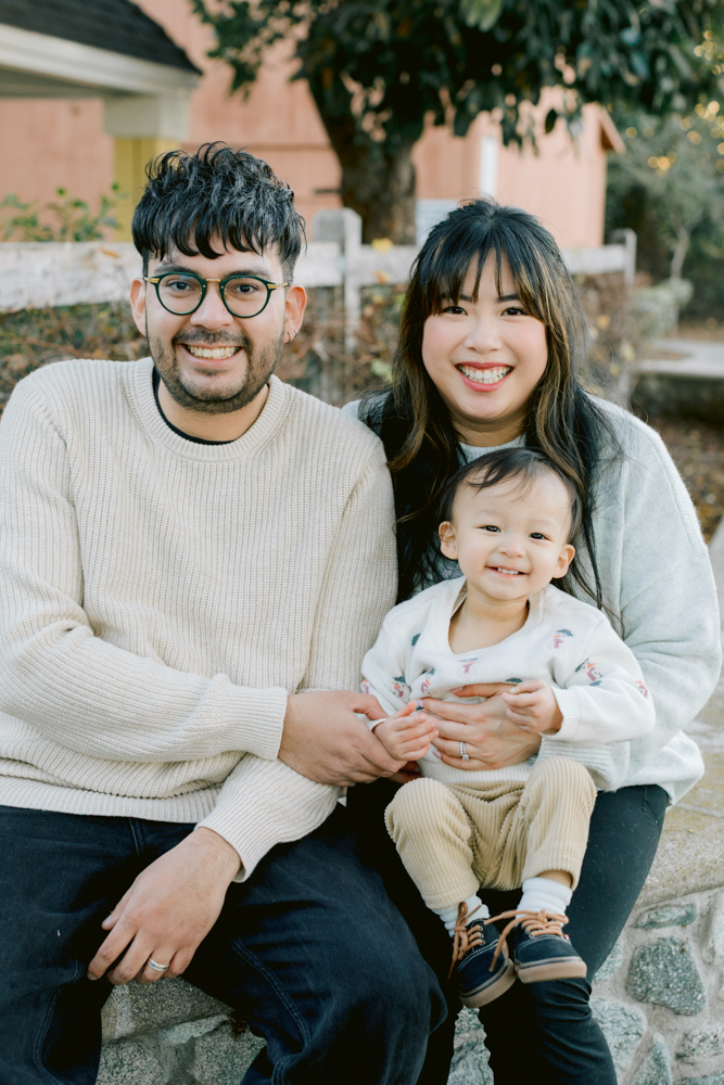 Family laughing together during a holiday mini session in Orange County