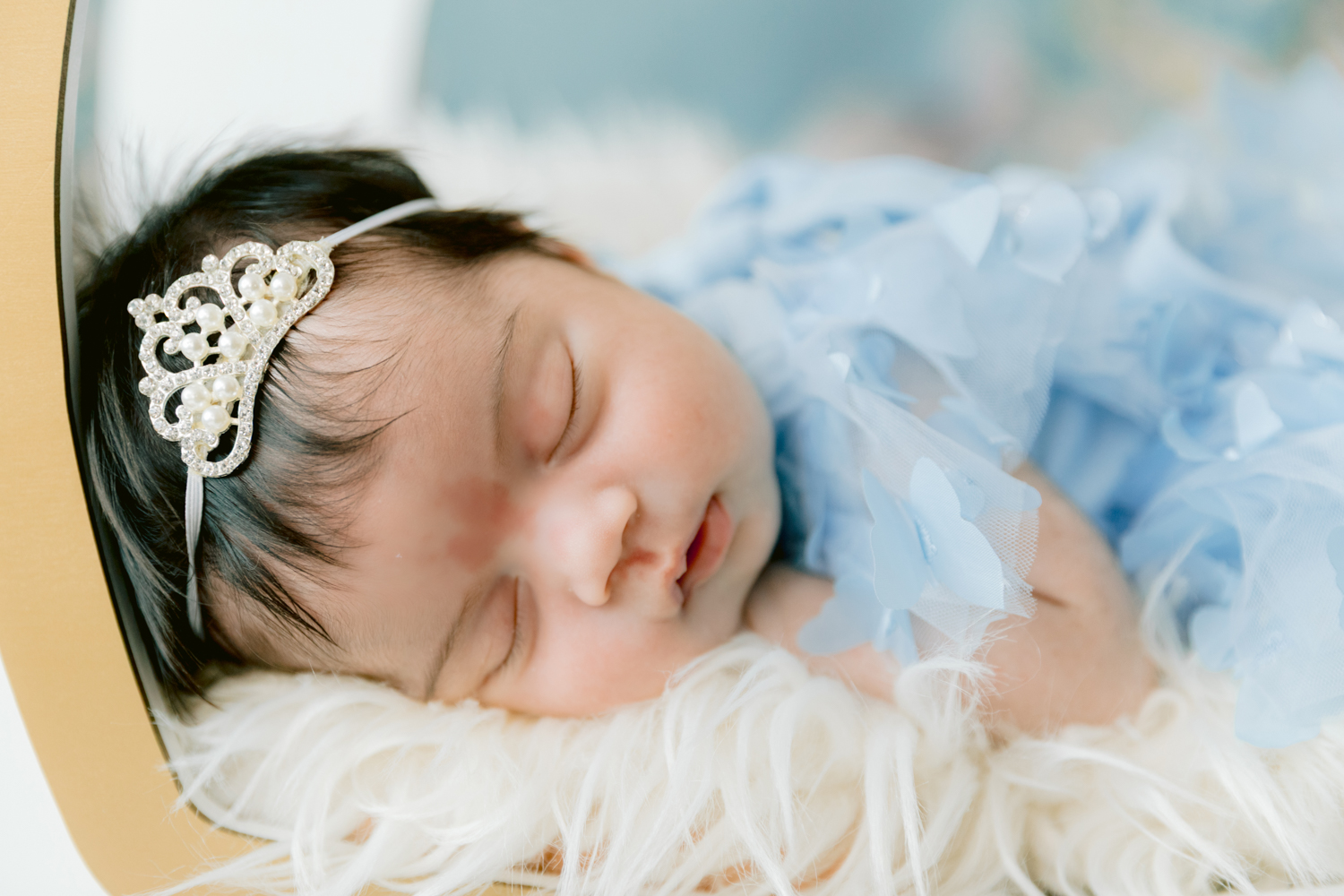 Cinderella inspired newborn photo session at a Santa Ana photography studio