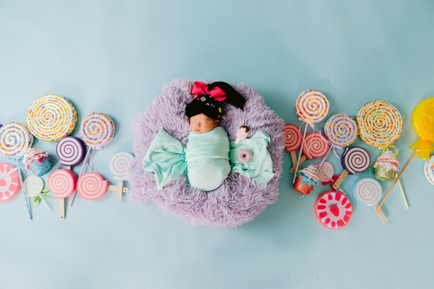 Vanellope von Schweetz–inspired newborn session at a Santa Ana studio