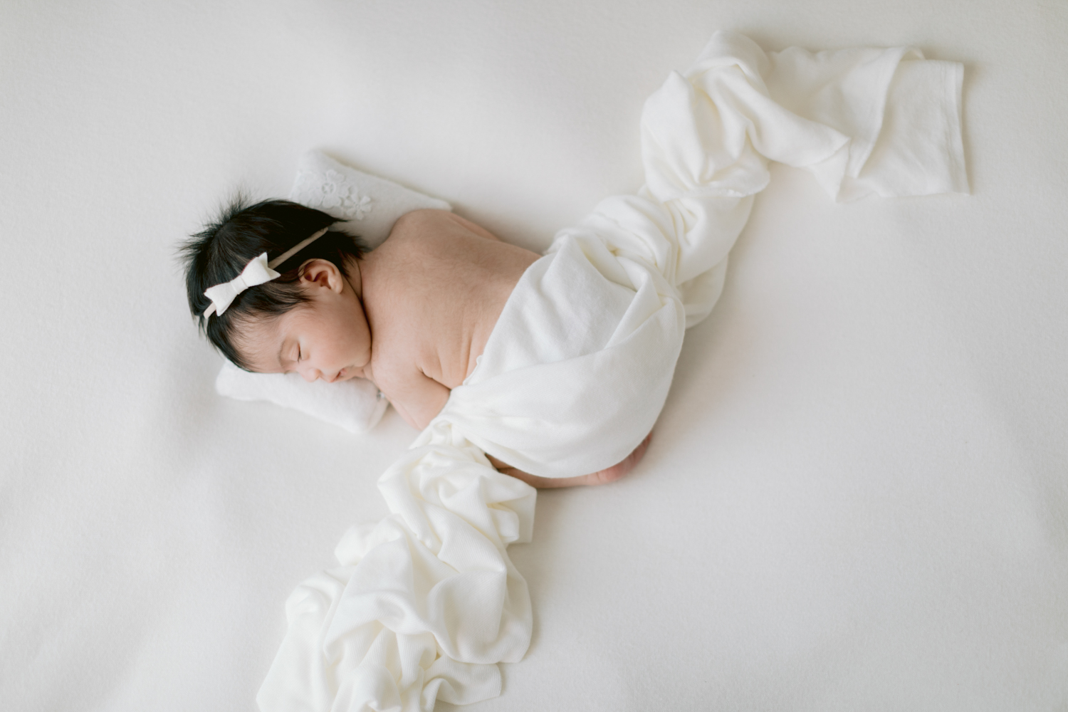 newborn photos taken in Santa Ana, California in the OC at our photography studio