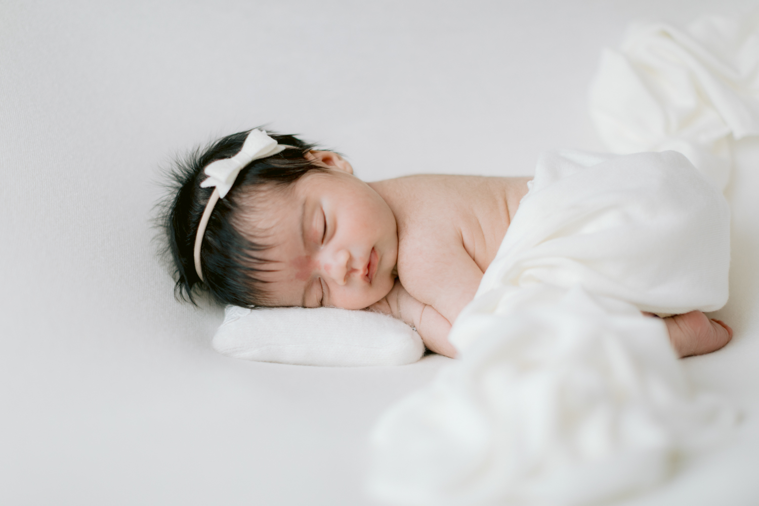 newborn photos taken in Santa Ana, California in the OC at our photography studio