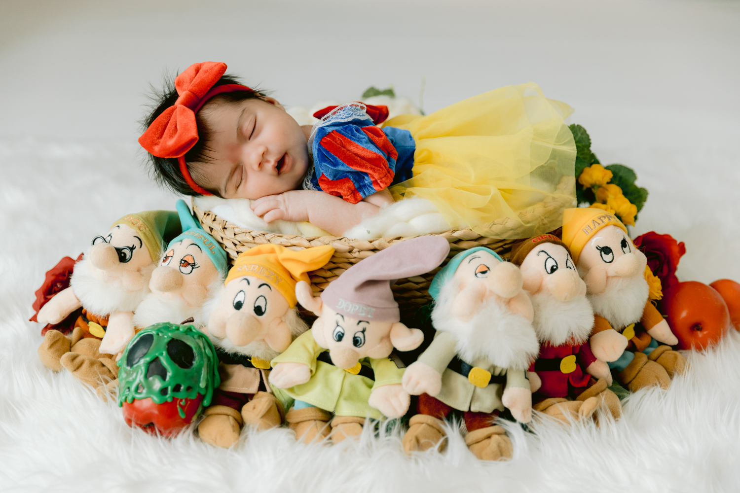 Snow White inspired newborn setup at our Santa Ana Photography Studio