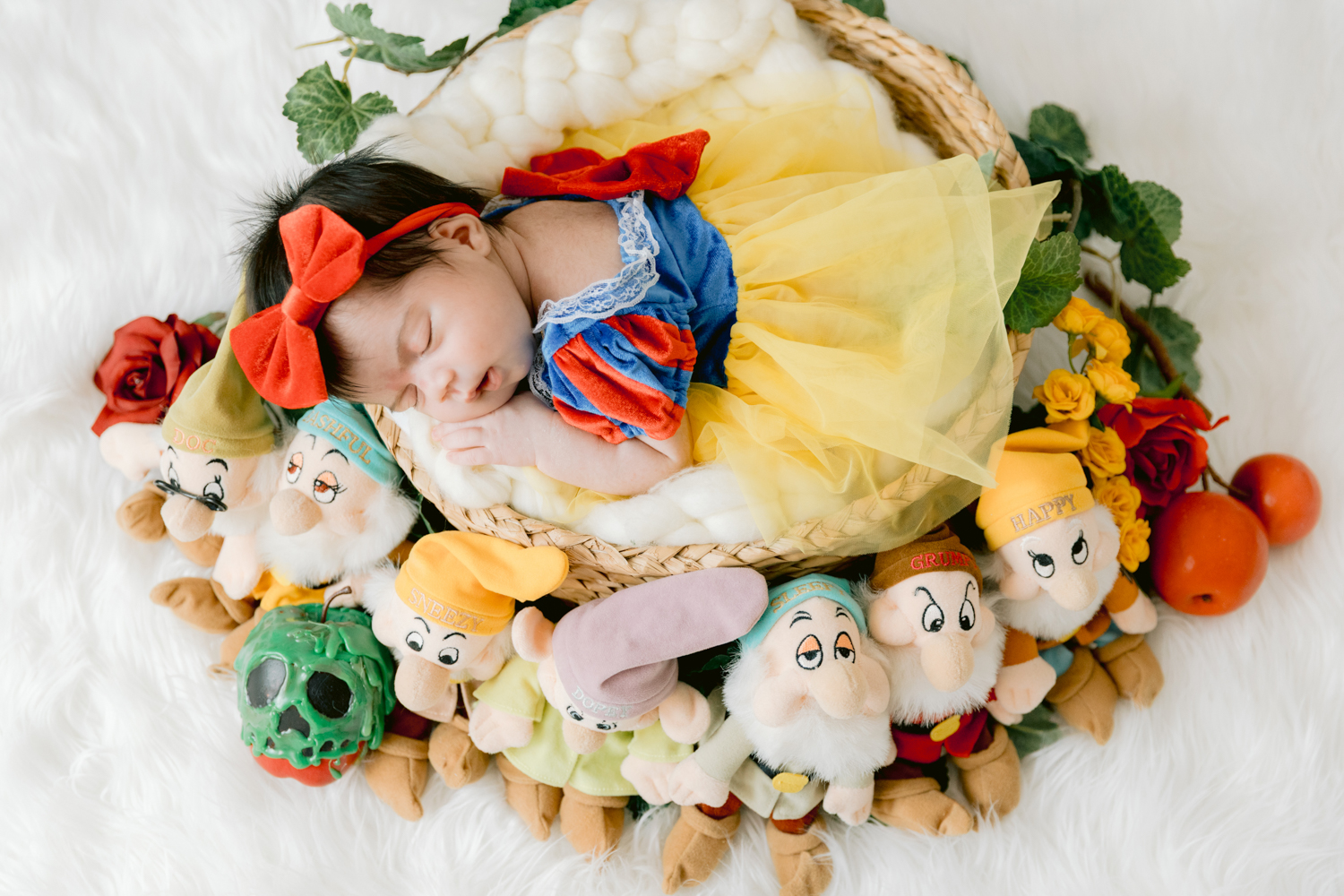 Snow White inspired newborn setup at our Santa Ana Photography Studio