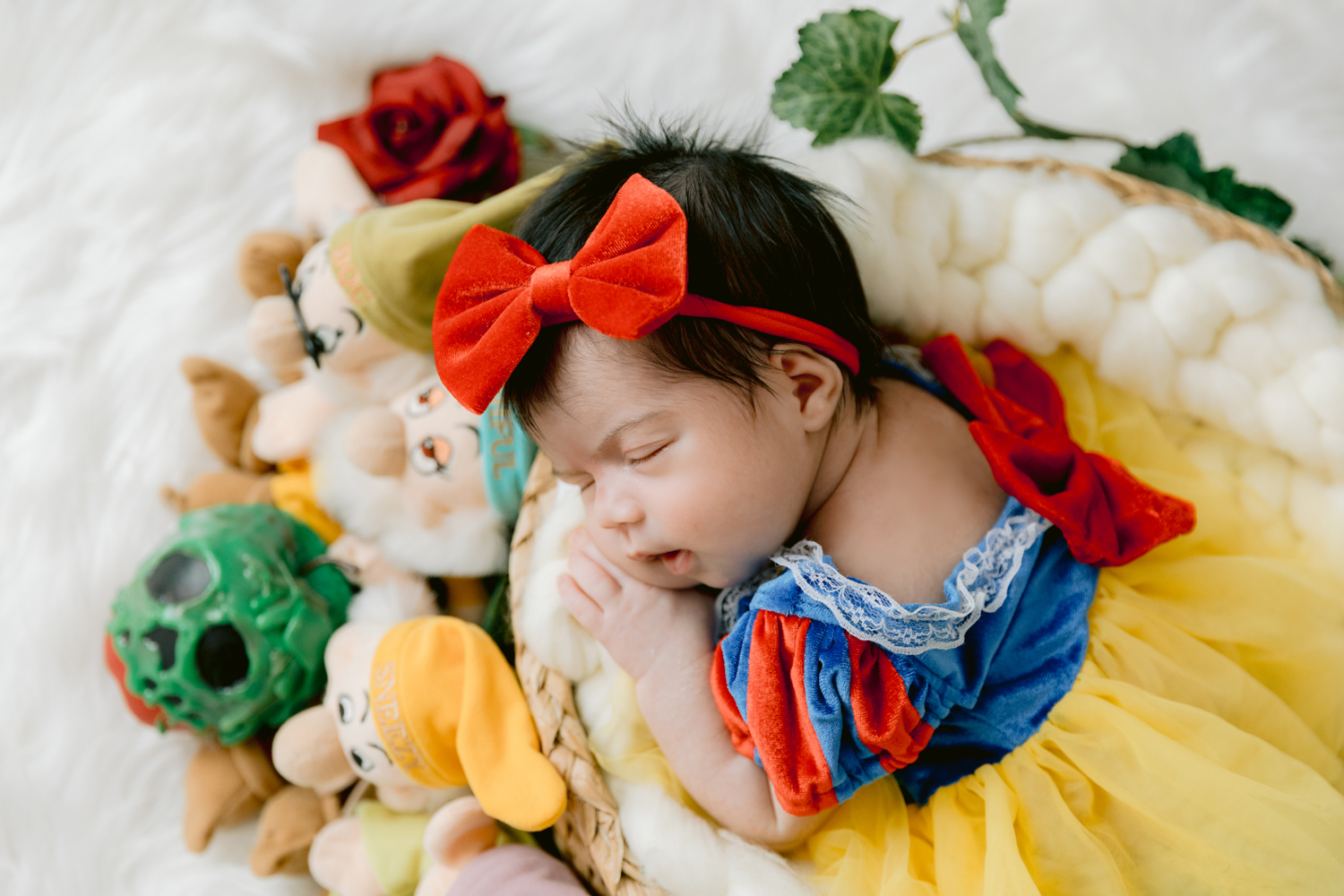 Snow White inspired newborn setup at our Santa Ana Photography Studio