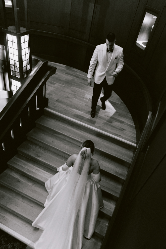 First look on the Grand Californian Hotel staircase before a Disney wedding