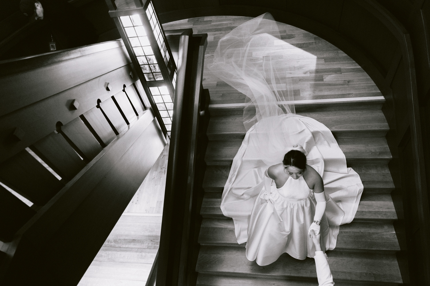 First look on the Grand Californian Hotel staircase before a Disney wedding