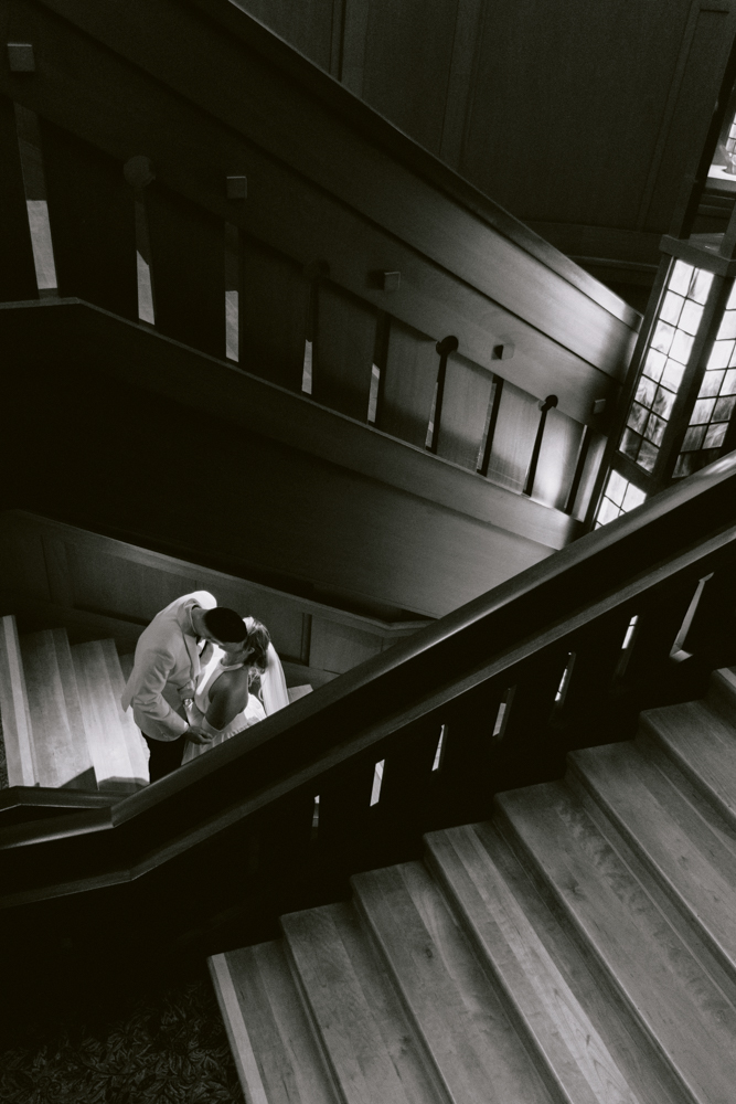 First look on the Grand Californian Hotel staircase before a Disney wedding