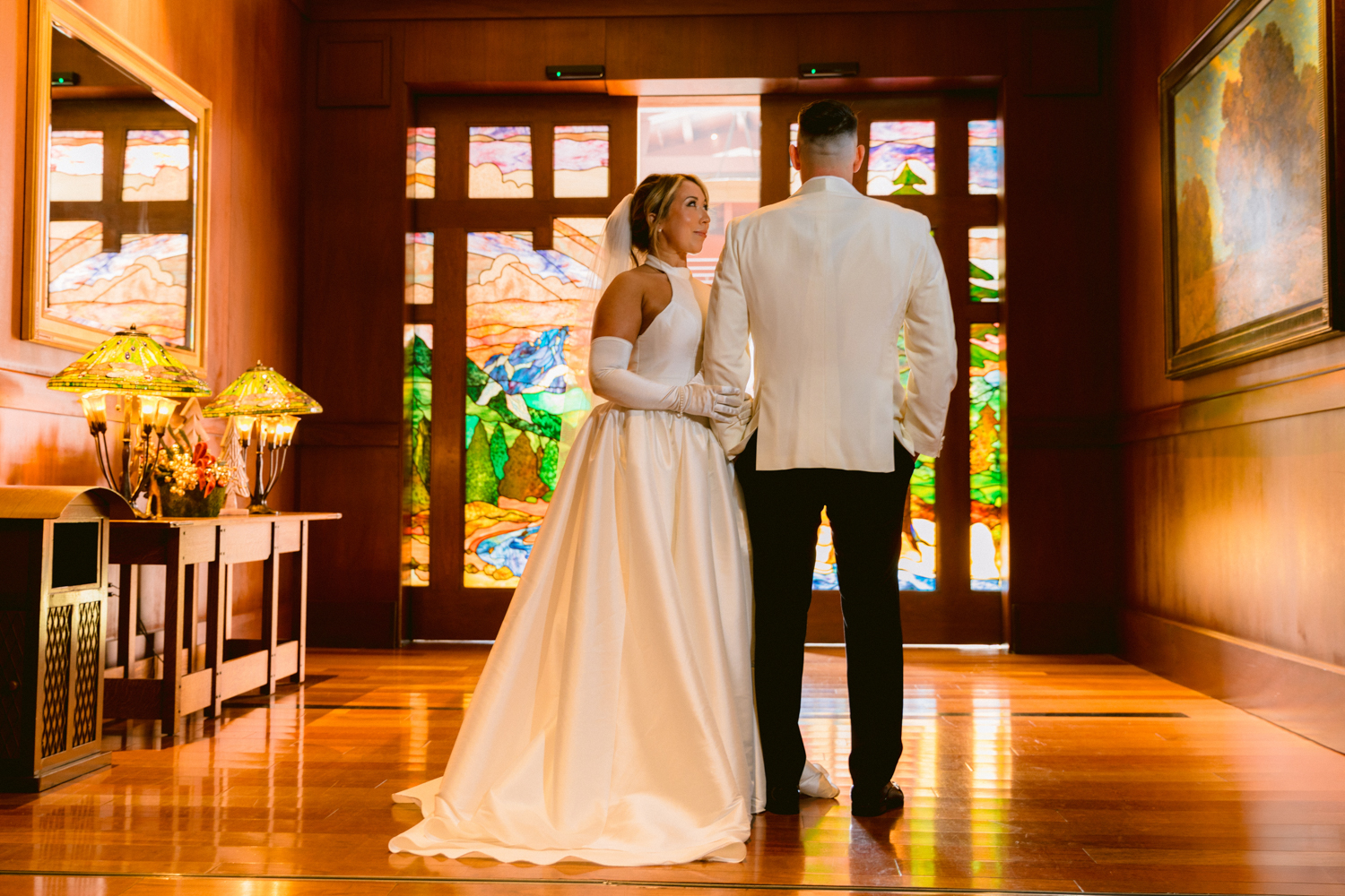First look on the Grand Californian Hotel staircase before a Disney wedding