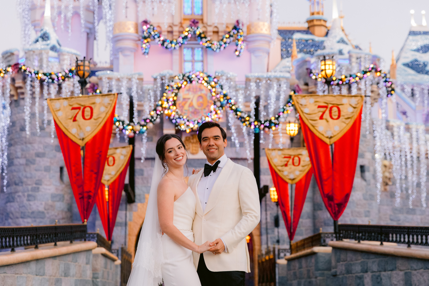 Holiday castle session at Disneyland Park with Christmas lights